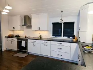 Smooth sprayed cabinet painting in a New Hampshire kitchen remodel