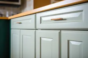 Cabinet painting in Sunapee NH white sprayed kitchen cabinets in a remodel
