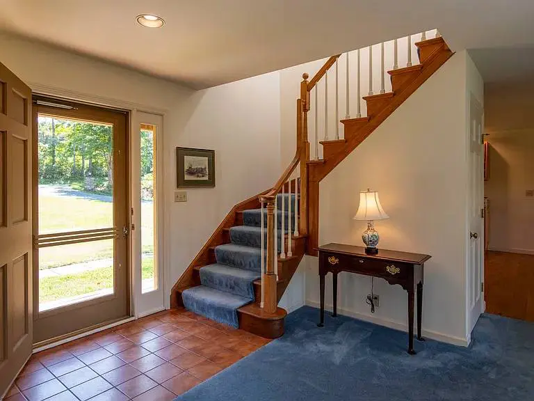 Interior house painting with crisp trim in a Sunapee NH living room