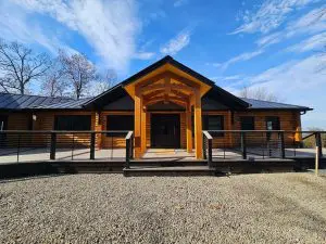 Exterior house painting with crisp trim in a Sunapee NH front wood porch