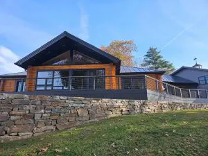 Exterior house painting with crisp trim in a Sunapee NH front wood
