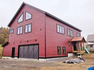 Exterior house painting with crisp trim in a Sunapee NH whole house