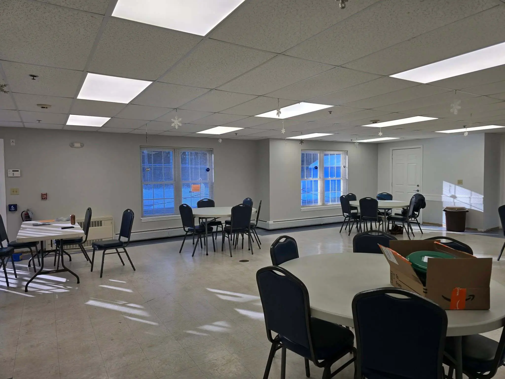 Commercial painters working in an occupied office space in Sunapee NH