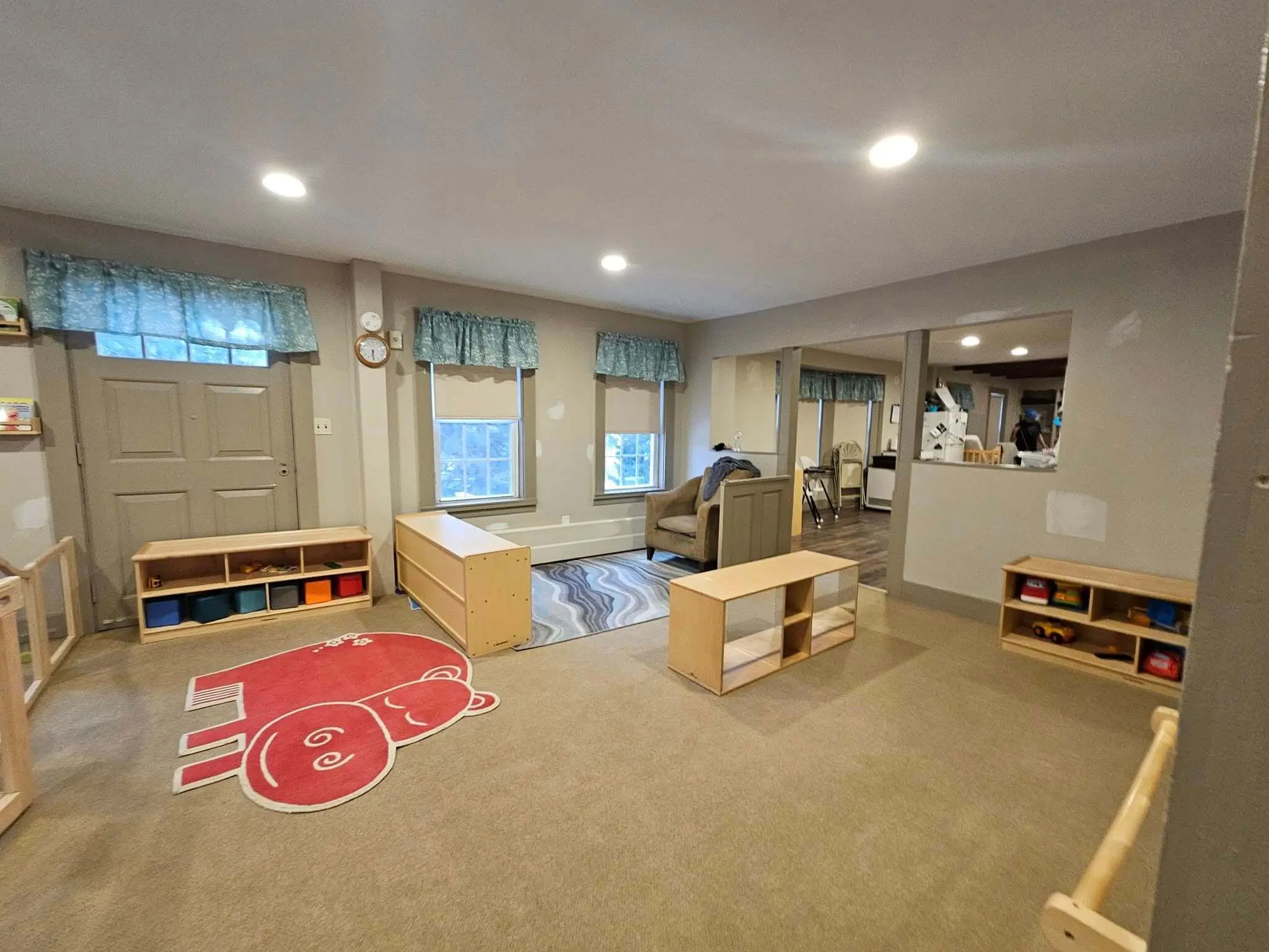 Commercial painting in a Sunapee NH childcare center with soft beige walls