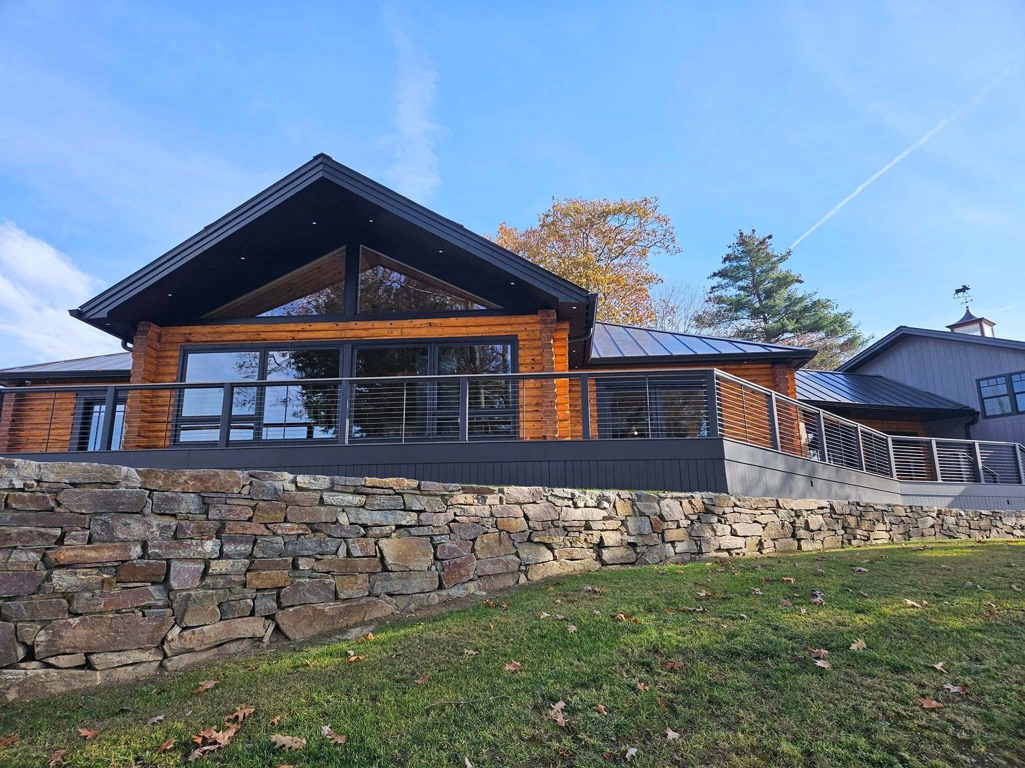 Exterior house painting with crisp trim in a Sunapee NH front wood